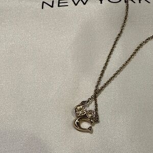 Coach Gold-Tone Pendant Necklace